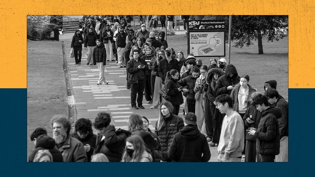 Students lined up at Kent campus receiving prophylactic antibiotics