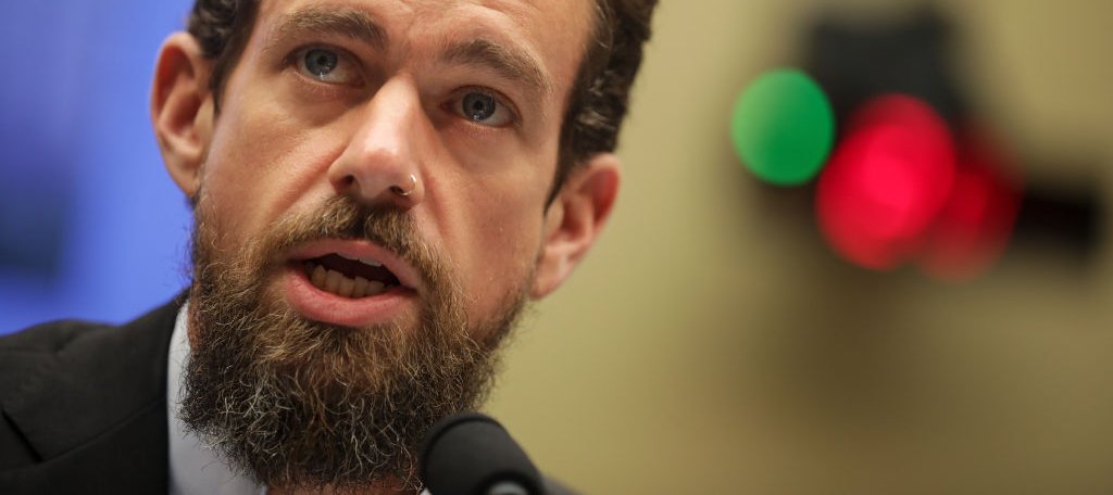 Block employees leaving the office after layoff announcement