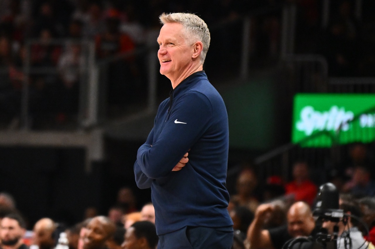 Golden State Warriors coaching staff during an NBA game in April 2026
